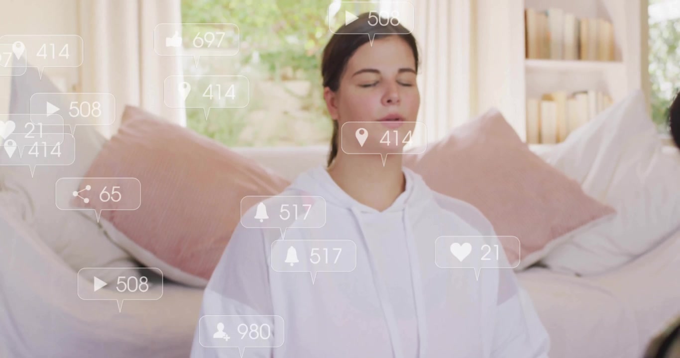Meditating woman initiating social media icons rising and visualizing engagement on camera