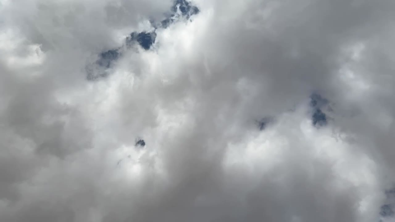 A view of sky full of clouds, close up shot, low angle shot