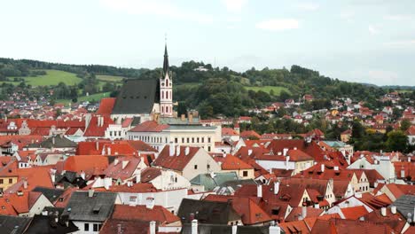 cesky krumlov, czech republic. st. vitus church and cityscape in sunny autumn day. unesco world heritage site