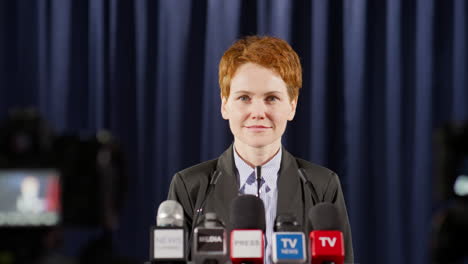 portrait of female politician at press conference