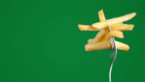 french fries on a fork slowly rotates.