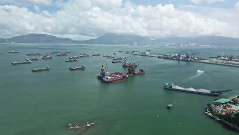 an aerial view of dredger ship in tuen mun pier, new territories, hong kong