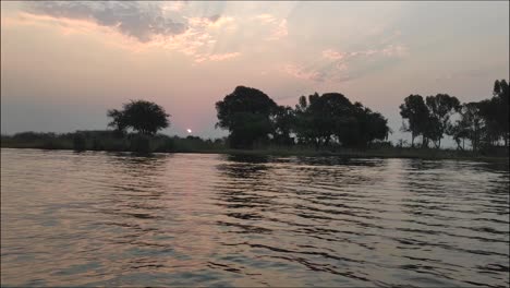 boat safari along the chobe river at sunset