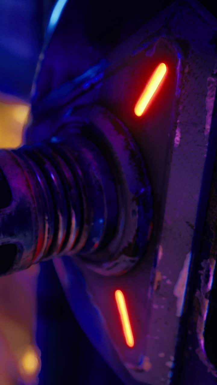 Close view of a detail with lights in a dark space during a technology event
