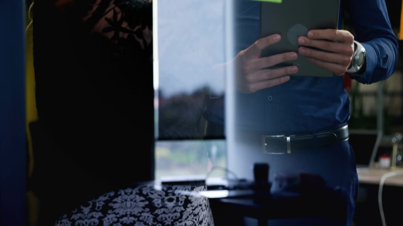 Product team holding tablet and marking glass while arranging notes, driving like counts