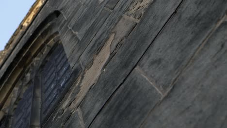 looking up at stained glass windows on old english church