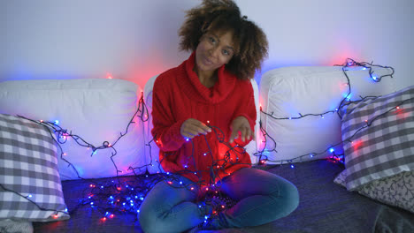 Coquettish-model-in-sweater-with-twinkle-lights