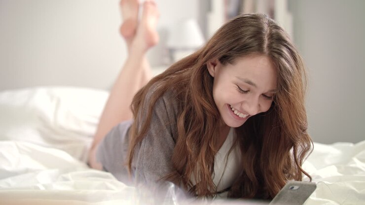 Young woman having a video call on mobile phone