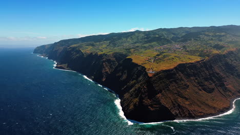 rocky shore of the madeira islands, portugal. huge inaccessible cliffs descend to the atlantic ocean waterscape. top view.