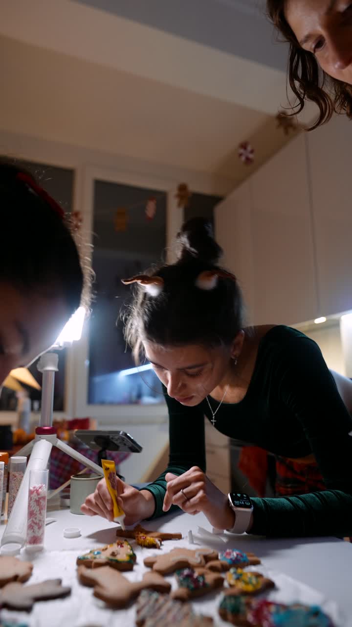 People Decorating Gingerbread Cookies