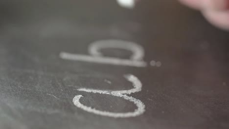 writing abc on a blackboard