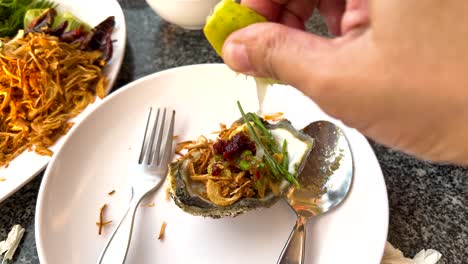 preparing a flavorful thai oyster dish