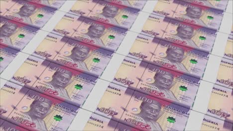 100 nigerian naira banknotes printed by a money press