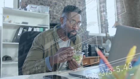 Animation of data processing over african american businessman having lunch in office