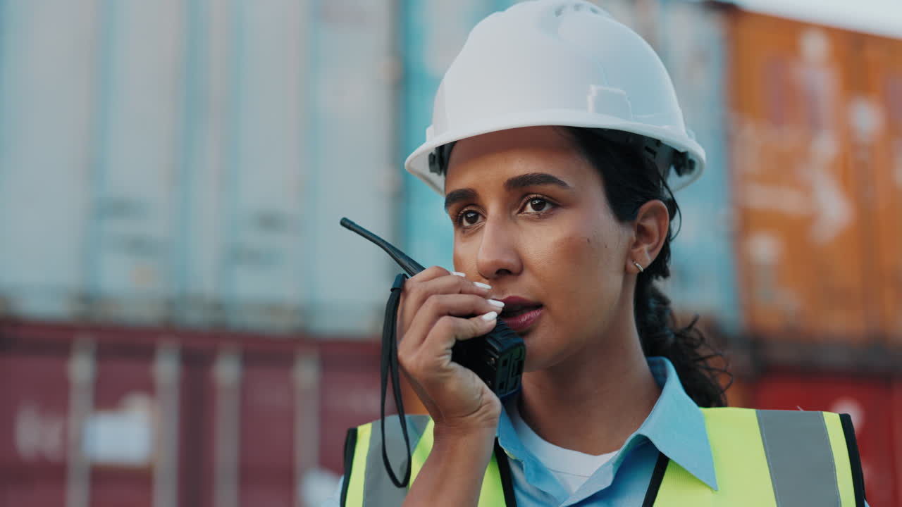 Woman Using Walkie-Talkie at Cargo Port