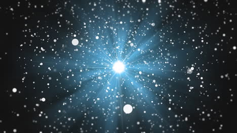 animación de la nieve de navidad cayendo sobre un reflector pulsante brillante sobre un fondo negro.