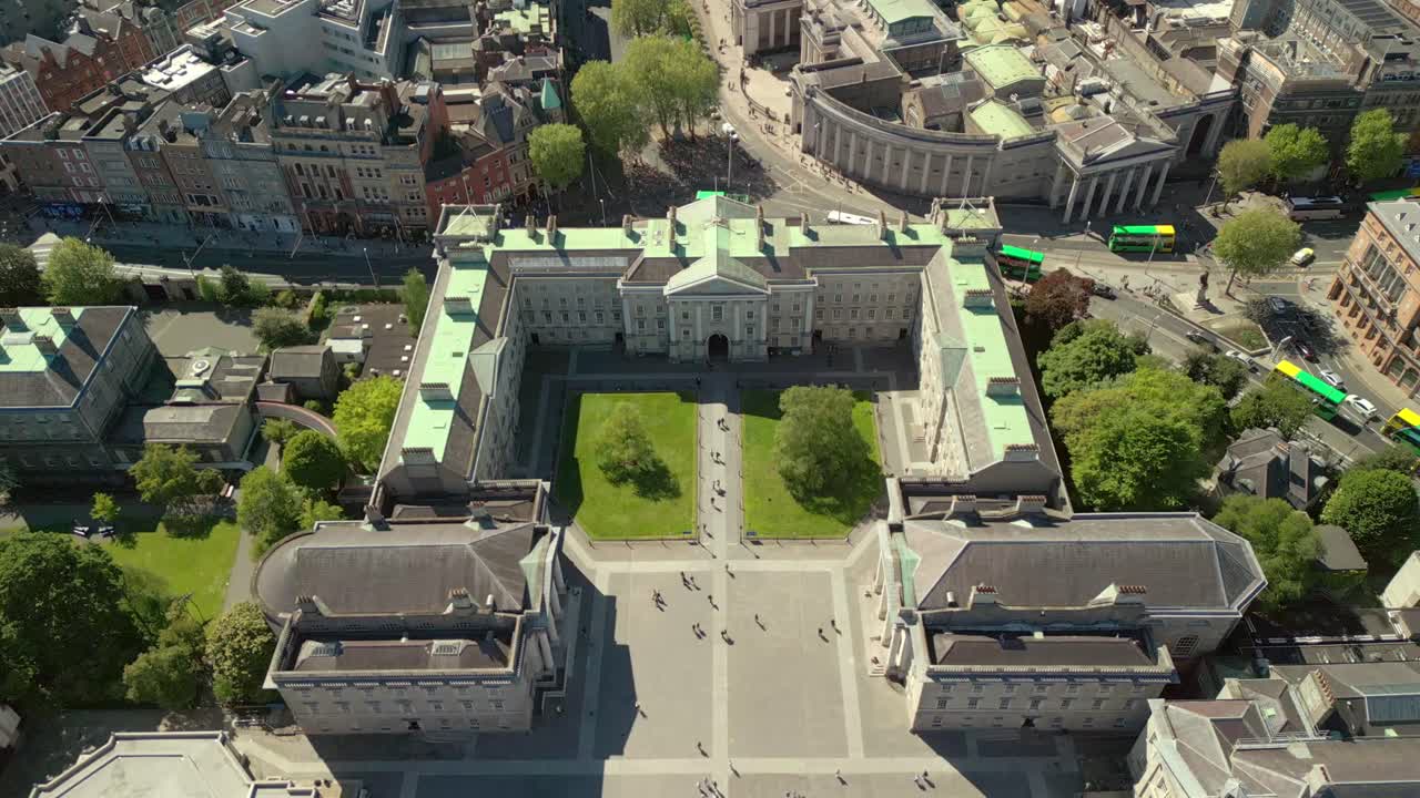 Reversing overhead aerial video of the campus and surrounding areas of Trinity College in Dublin, Ireland on a sunny day. Filmed in 4K, 60FPS and with Rec709 color.