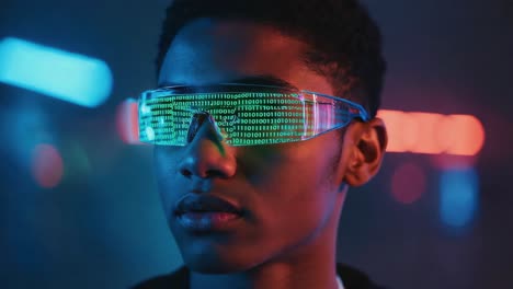 a person with futuristic glasses displaying binary code