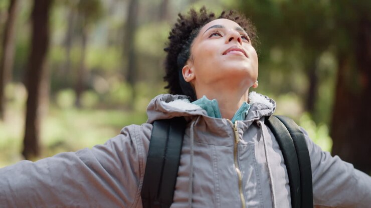 Freedom, fitness hiking and woman in nature park