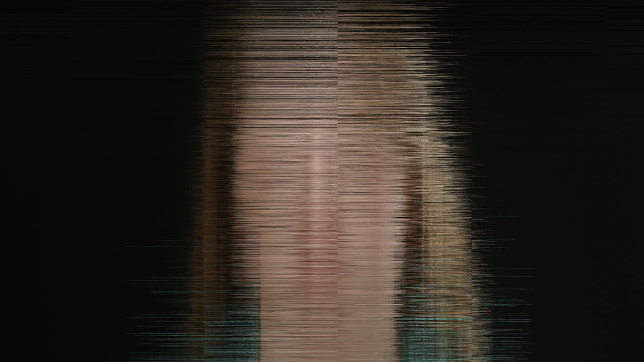 Female head shot breaking into pixelated squares with glitch and distortion