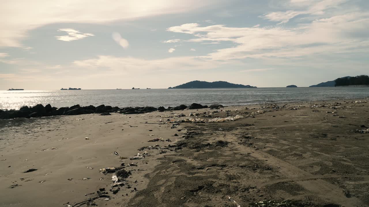 Summer Beautiful View Of Teluk Likas Beach, White Sandy Beach, Small Island, Blue sea water And Green Trees,Kota Kinabalu,Sabah,Malaysia.