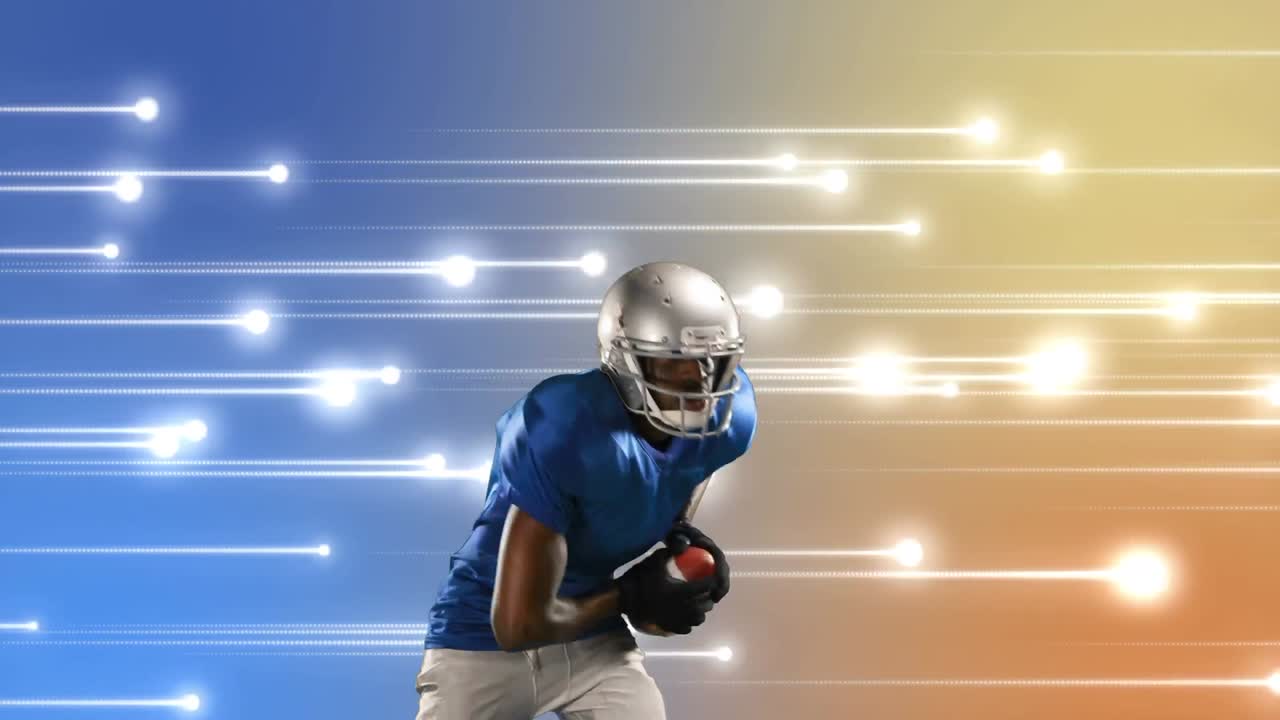 Giocatore di football americano che tiene un pallone da football