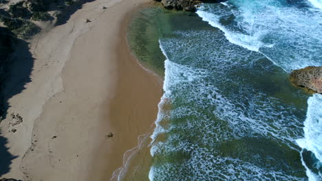 Aerial-drone-shots-over-a-stunning-beach-during-summer