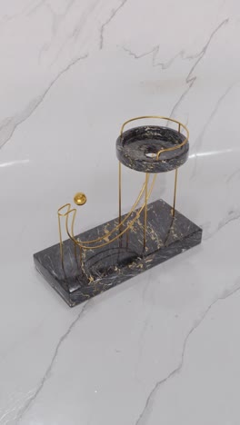 stylish marble coaster with gold accents