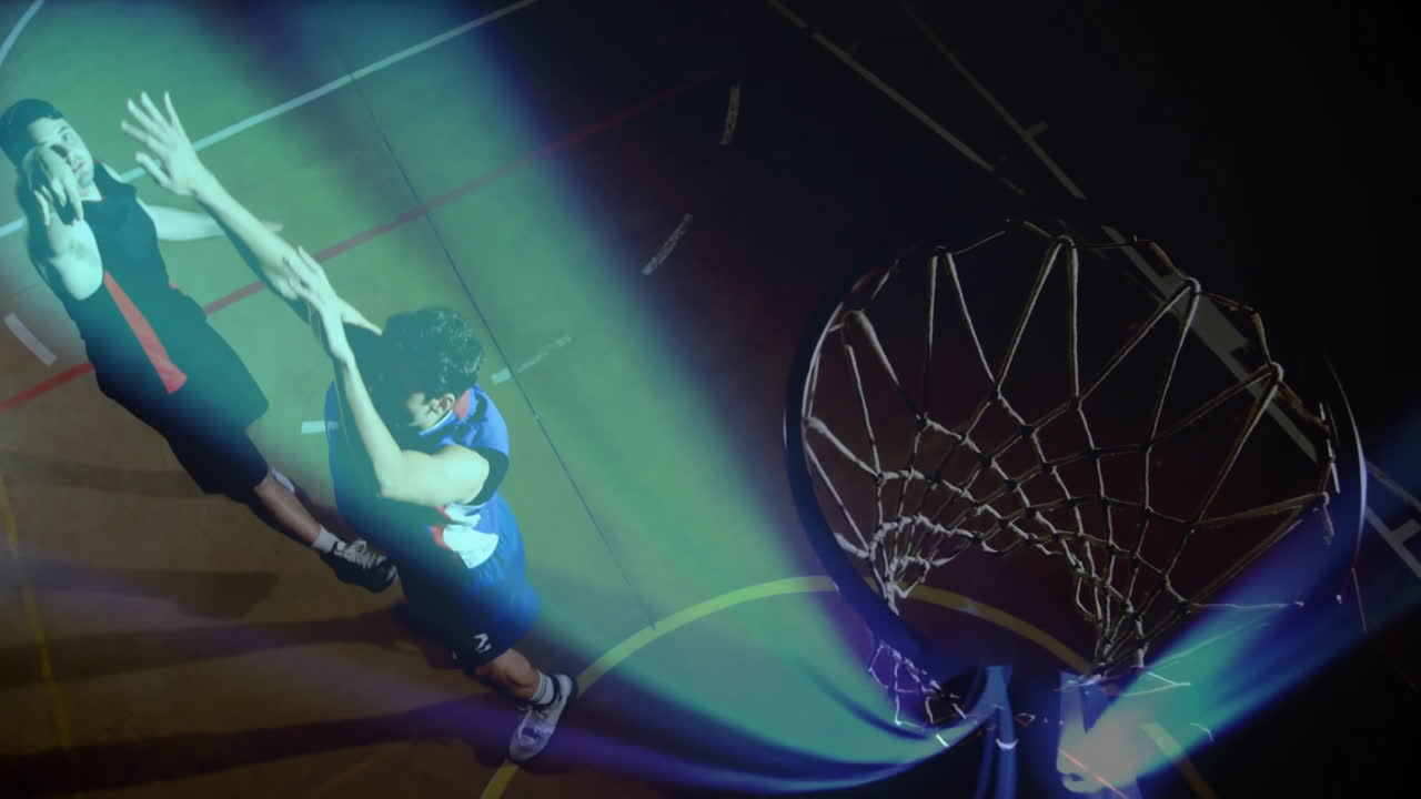 Shooting basketball towards hoop, player in animation with dynamic light effects