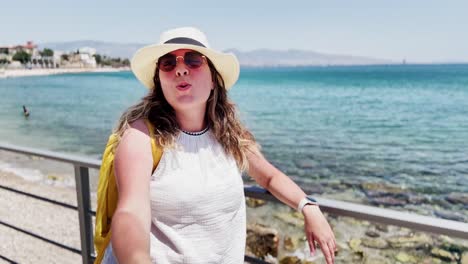travel vlogger's candid moment on athens coastline