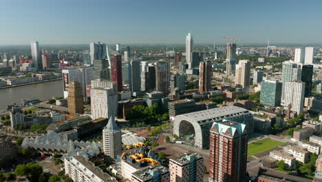 panorama of rotterdam skyline and nieuwe maas at daylight in netherlands