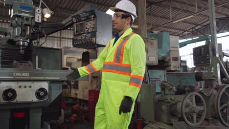 factory workers handshake with team member in the factory