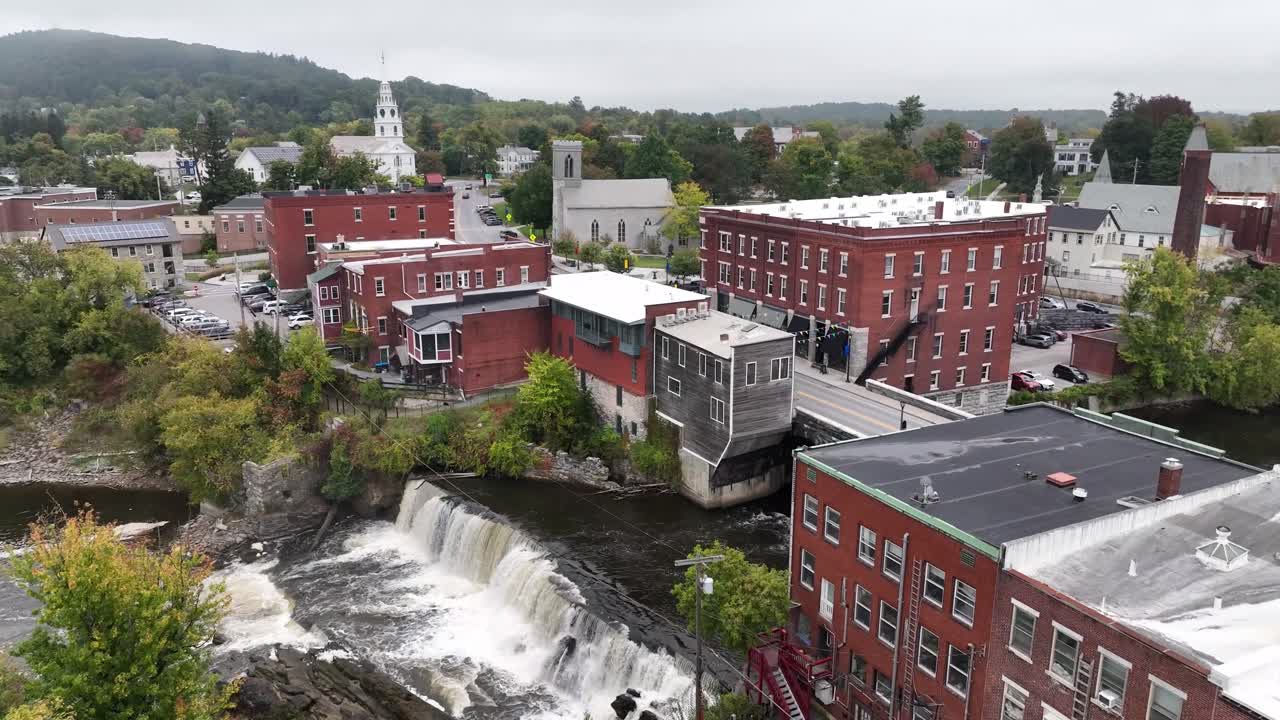 aerial over waterfall in the town of middlebury vermont