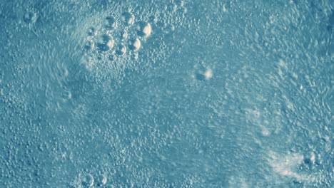 Sauerstoffblasen-Im-Wasser-Auf-Einem-Blauen-Abstrakten-Hintergrund
