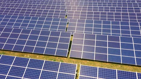 closeup of surface of blue photovoltaic solar panels for producing clean ecological electricity