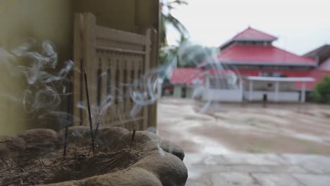 Incense-burning-peacefully-in-a-temple-doorway