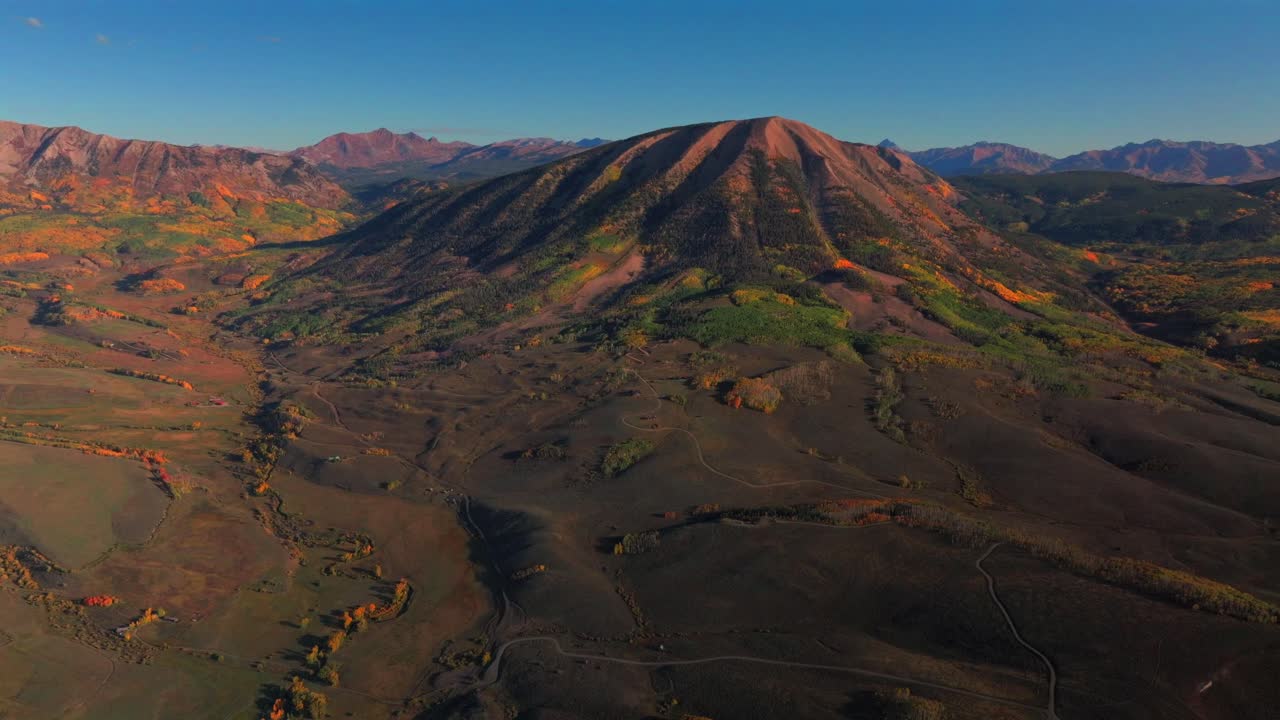 Crested Butte Ohio Pass Swampy Pass Kebler Pass fall autumn Colorado aerial drone Elk Range Rocky Mountains Beaver Ponds morning bluesky sunny Gunnison National Forest yellow Aspens trees forward up