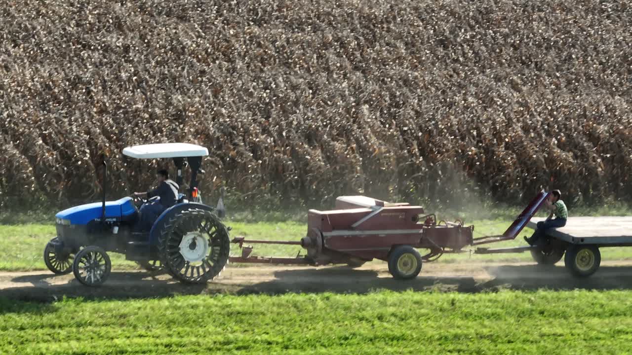 Tractor and Trailer in Cornfield