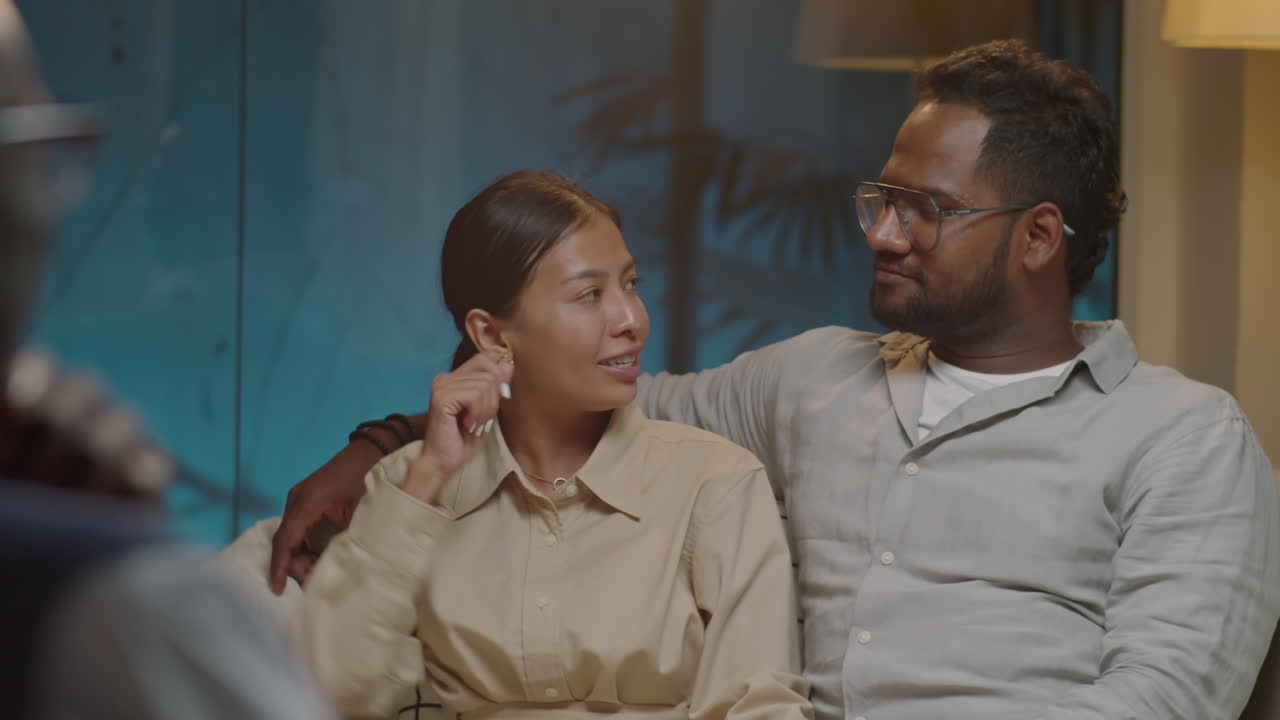 Diverse Couple Discussing Relationships with Psychologist