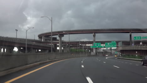 Driving-on-a-highway-during-a-rainstorm