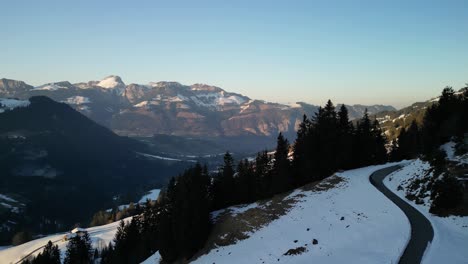 Panning-view-of-a-mountain-range-in-the-Swiss-Alps-filmed-with-a-drone