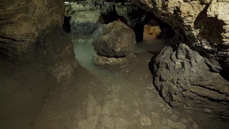 underground dark stone cave camera movement underground dark stone cave camera movement