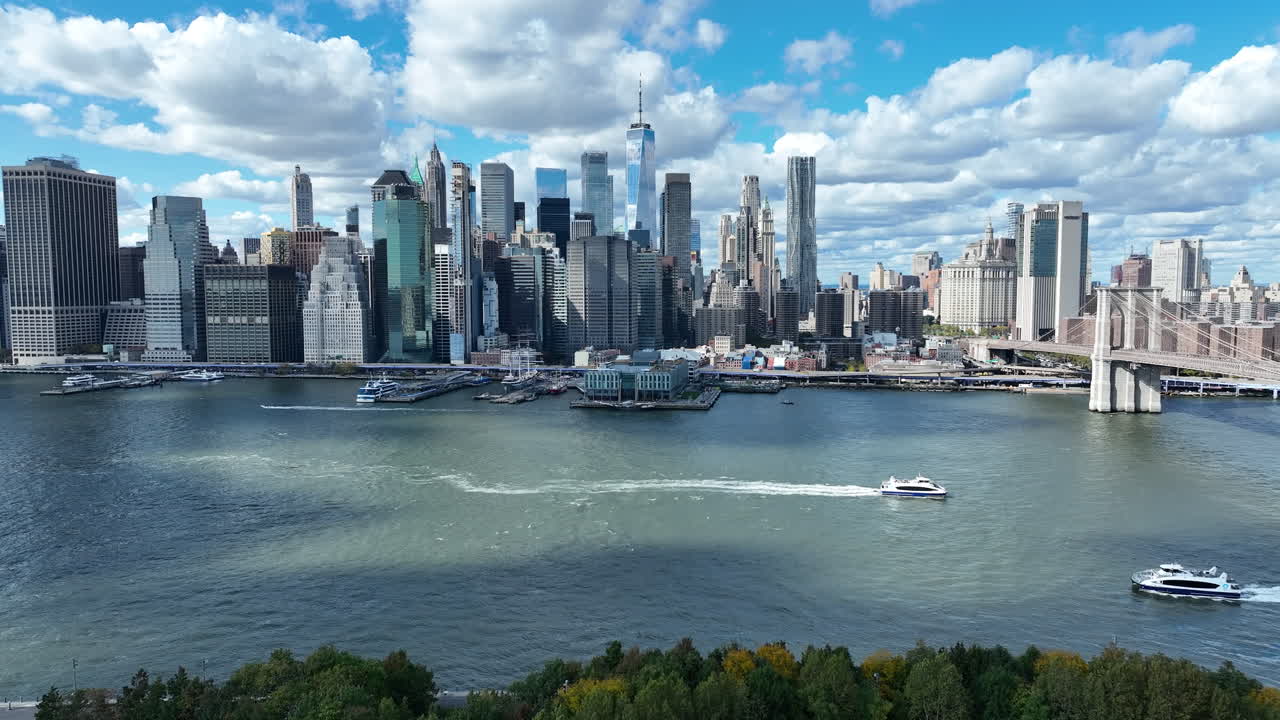 Manhattan Skyline In New York City With A View Of Skyscrapers Along The Hudson River. Aerial Slow Motion Shot