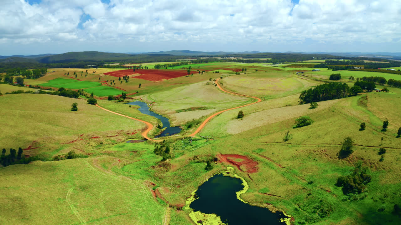 Vast Fields And Creeks In The Countryside Of Atherton Tablelands Region, Queensland, Australia - aerial drone shot