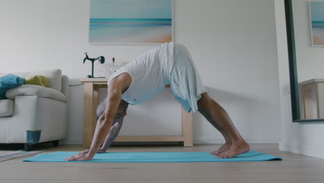 downward and upward facing dog and for relief of lower back pain by a 40-year-old middle eastern man