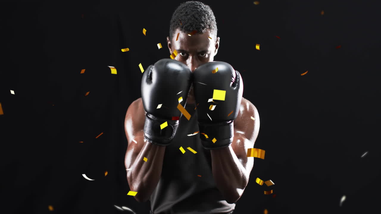 animación de confeti cayendo sobre un boxeador afroamericano en fondo negro