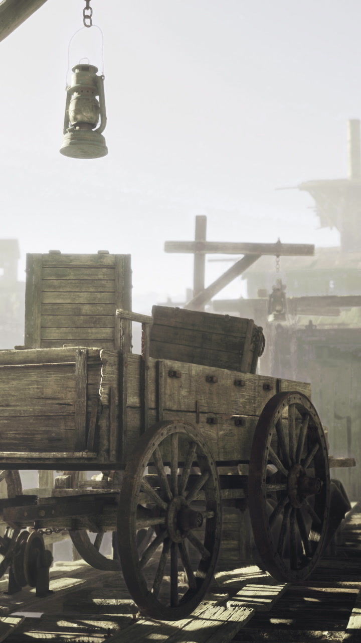 Old wooden cart by the dock in fog with lantern hanging above