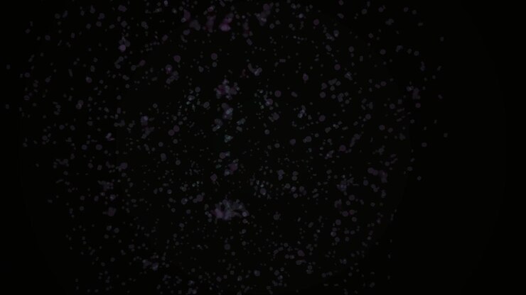 Particelle astratte luminose che fluttuano su uno sfondo scuro