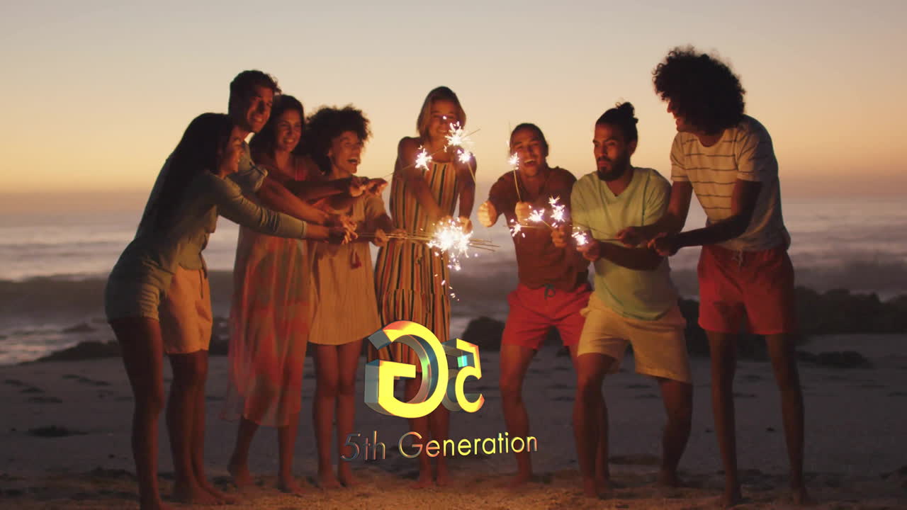 Celebrating with sparklers, diverse group on beach with animation text display