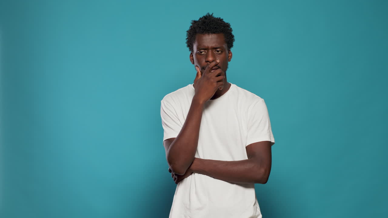 Concentrated man thinking about uncertain idea